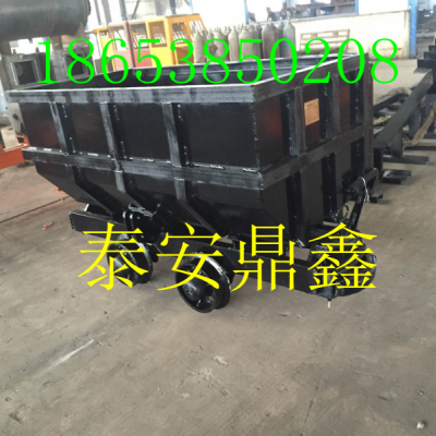 單側曲軌側卸式礦車，單側曲軌側卸